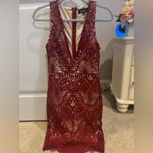 Red lace dress, with plunge neck. Homecoming or formal event, super pretty.
